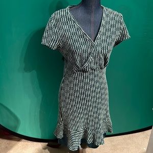 Knit, lined green, black and white form fitting dress